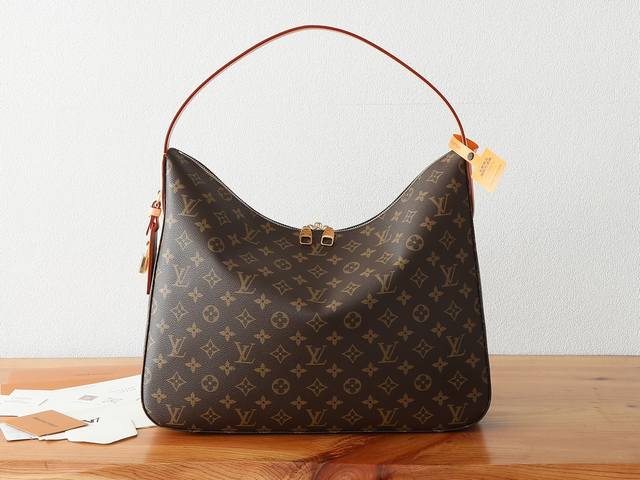 chip-coded version of premium original, enhanced Slouchy medium handbag features