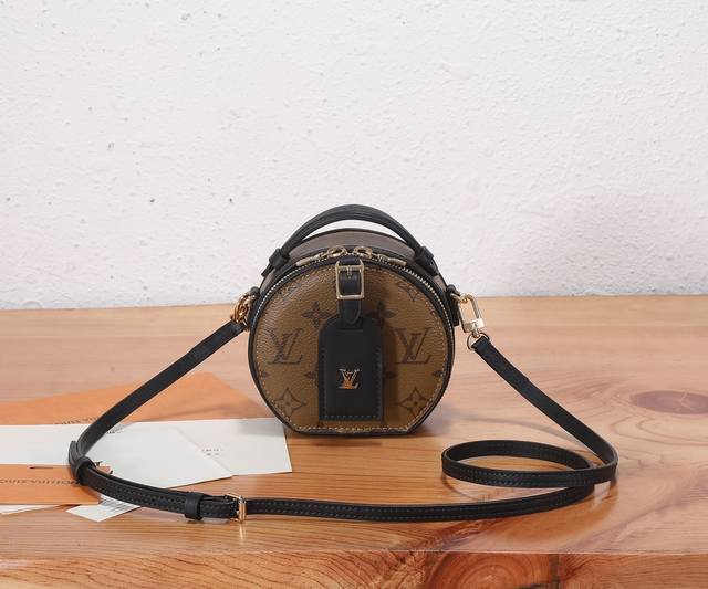 This premium, original, enhanced Bo?te Chapeau mini bag is crafted from Monogram