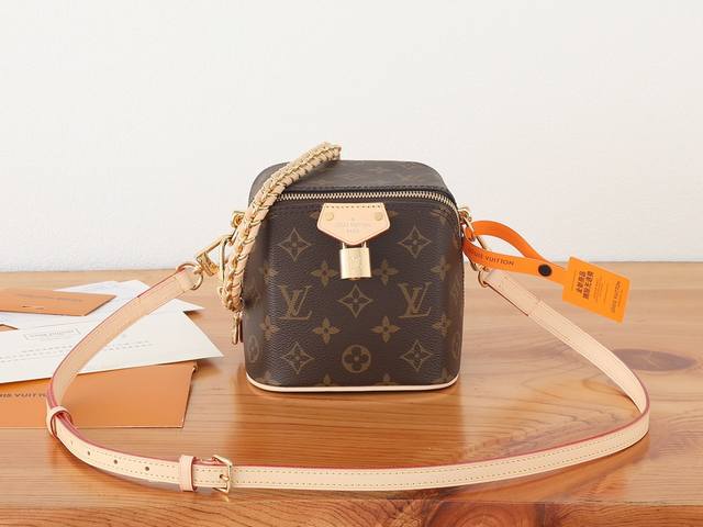 chip-coded version of premium original Just In Case handbag, enhanced in its ori