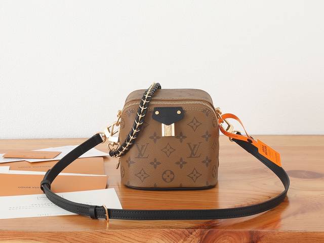 chip-coded version of premium original Just In Case handbag, a redesigned versio