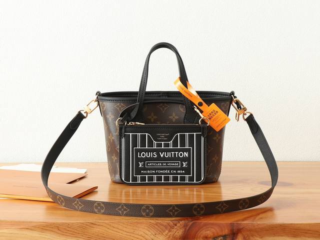 chip-coded version of top-of-the-line, enhanced Neverfull Bandouli