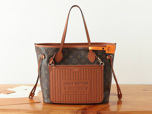 chip-coded version of premium, enhanced Neverfull Inside Out medium handbag feat