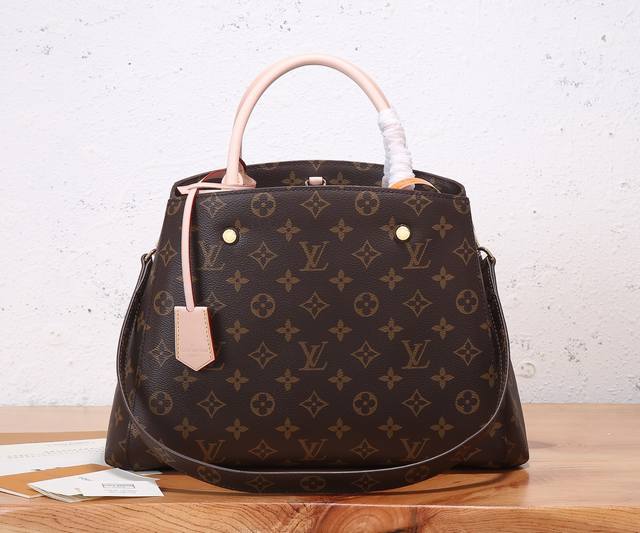 Premium Original, Enhanced Edition Montaigne Handbag in iconic Monogram canvas c
