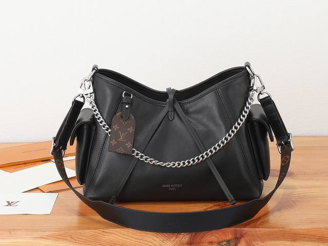 a chip-coded version of this Carryall Cargo Small bag, featuring premium origina