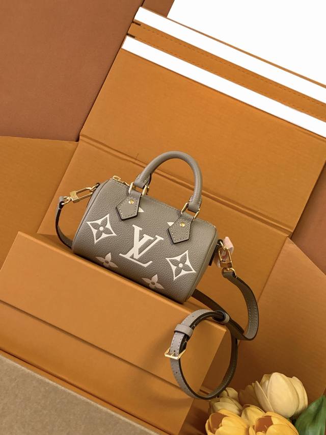 Exclusive First Release Model: M82890. This premium enhanced Nano Speedy handbag