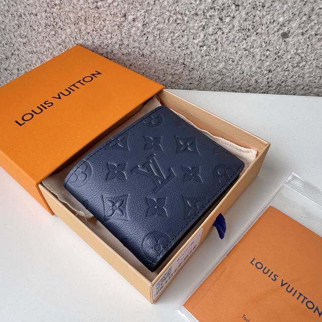 Authentic, top-grade, original M14787 short wallet in blue, featuring Maison's u