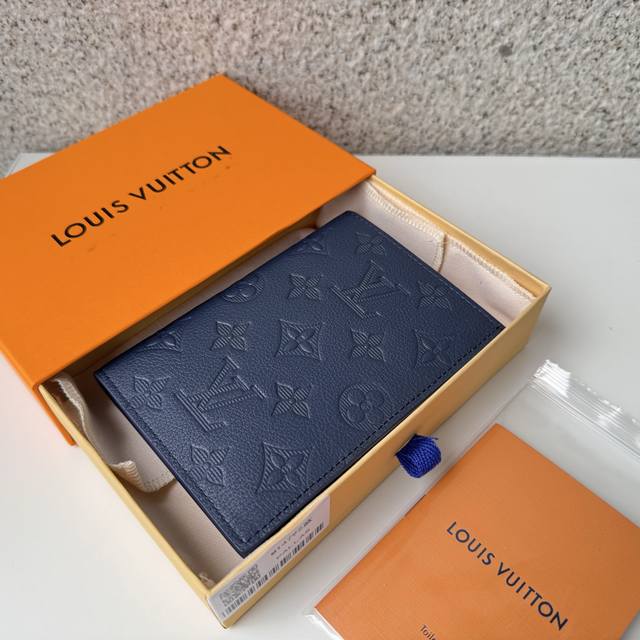 Authentic, top-grade original M14792 Passport Blue features embossed monobloc sh