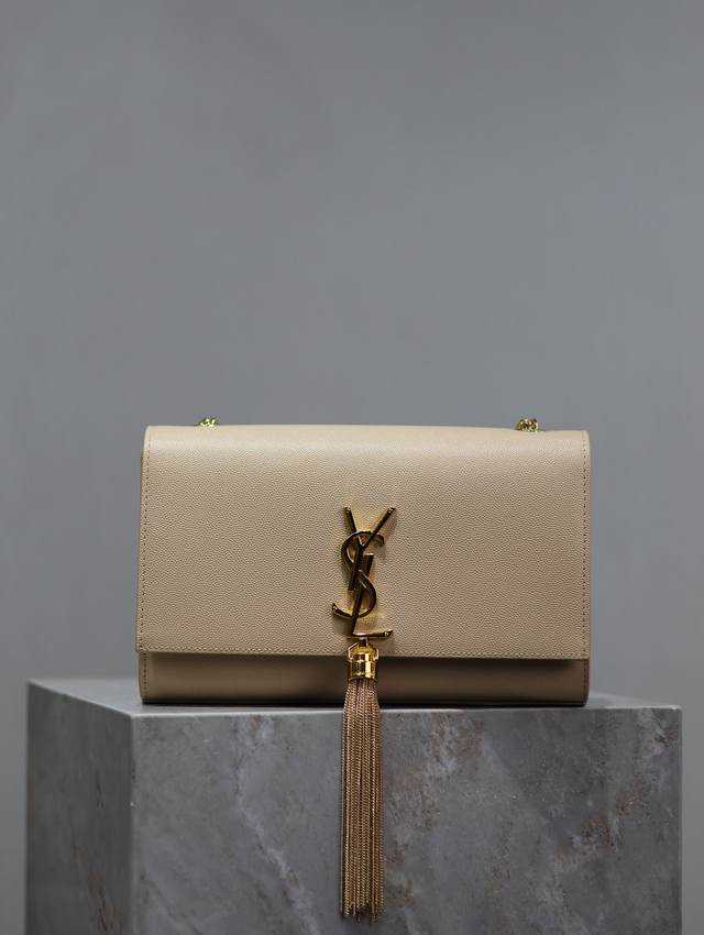 The timeless classic apricot gold-buckled caviar Kate 24cm tassel bag is a timel