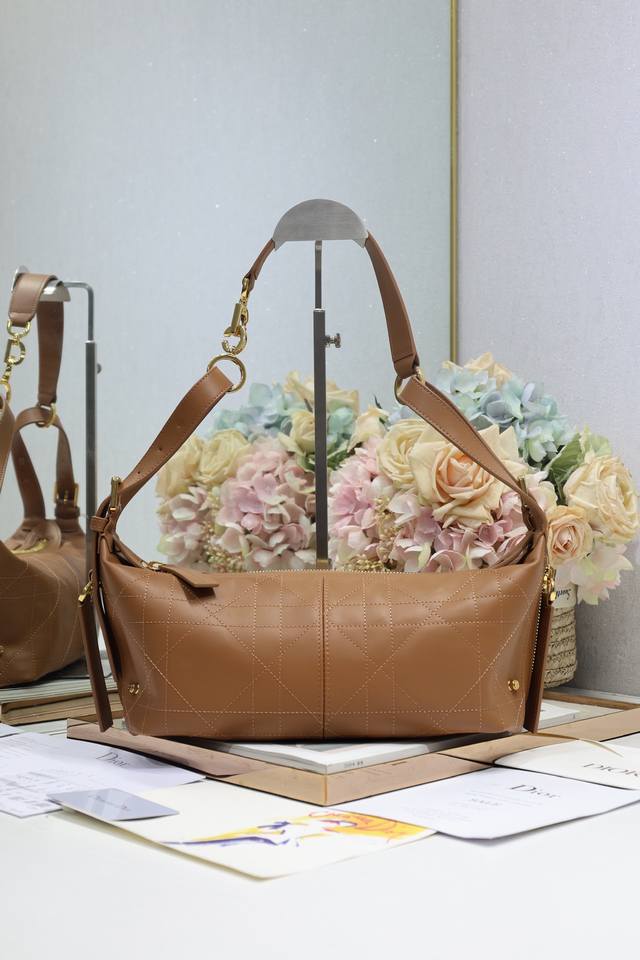 Authentic, high-edition small D-Journey handbag in caramel plain. This season's