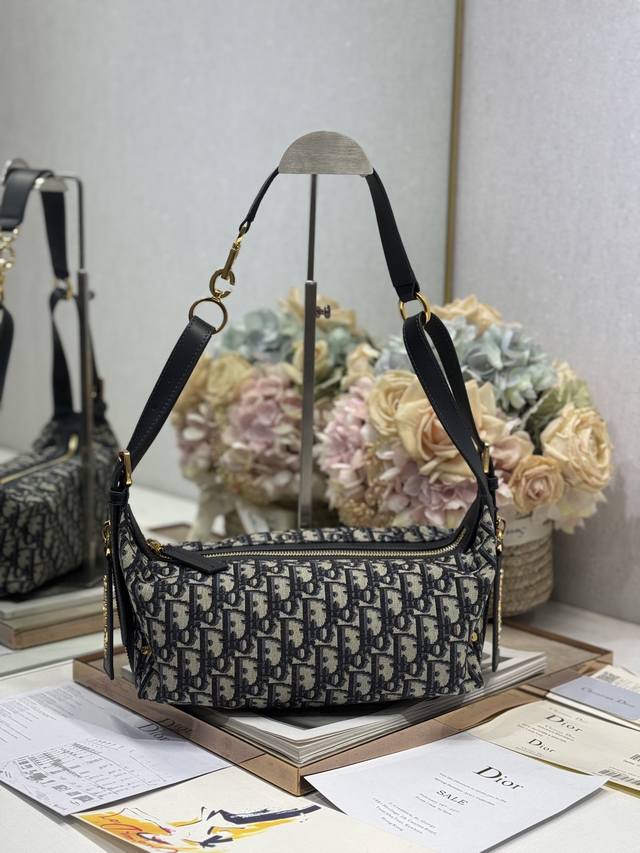 Authentic, high-version small D-Journey handbag with monogram and leather. This