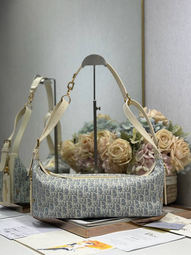 Authentic, high-version medium D-Journey handbag in gray D with leather. This D-