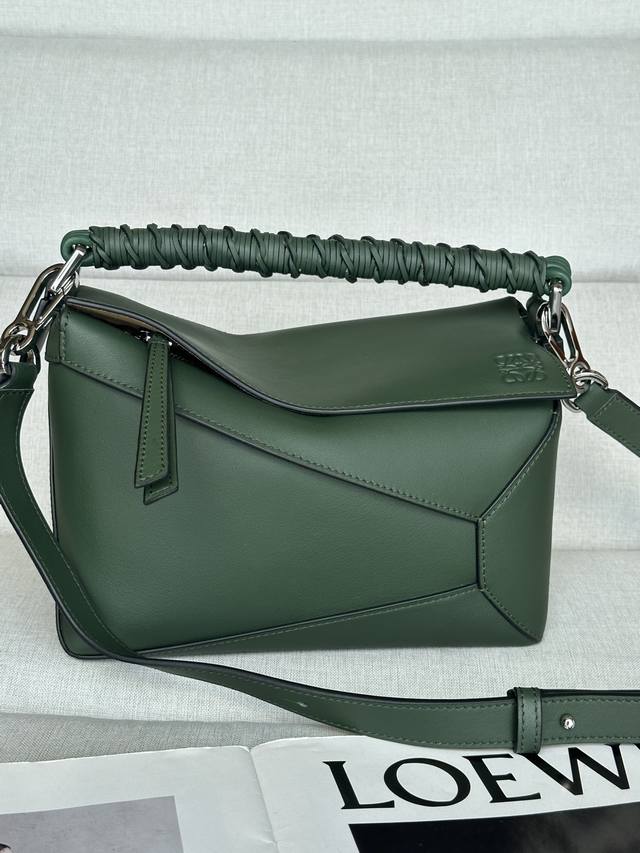 Original leather vintage green Loewe Puzzle classic braided handbag is more dist