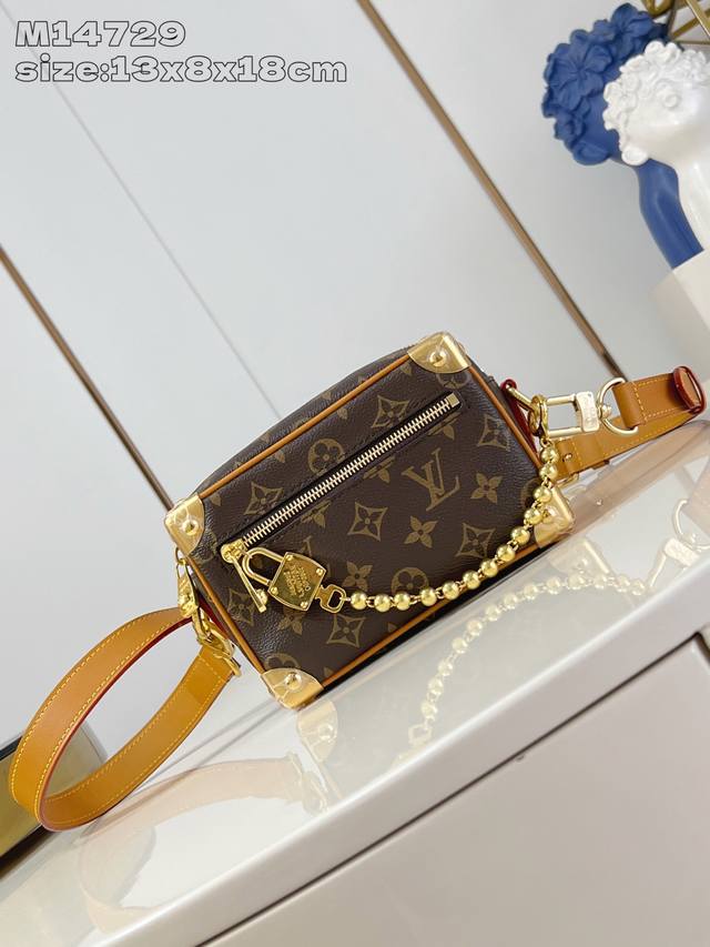 Top-grade original M14729 This Mini Soft Trunk handbag features a blend of Monog