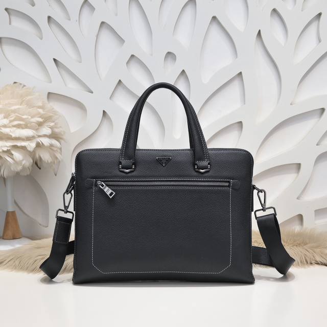 Prada - Prada's latest men's briefcase is made of imported calfskin. The leather
