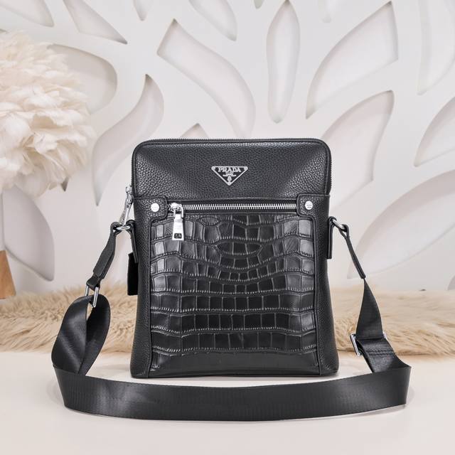 Prada - Prada's latest men's crossbody bag is made of imported calfskin. The lea