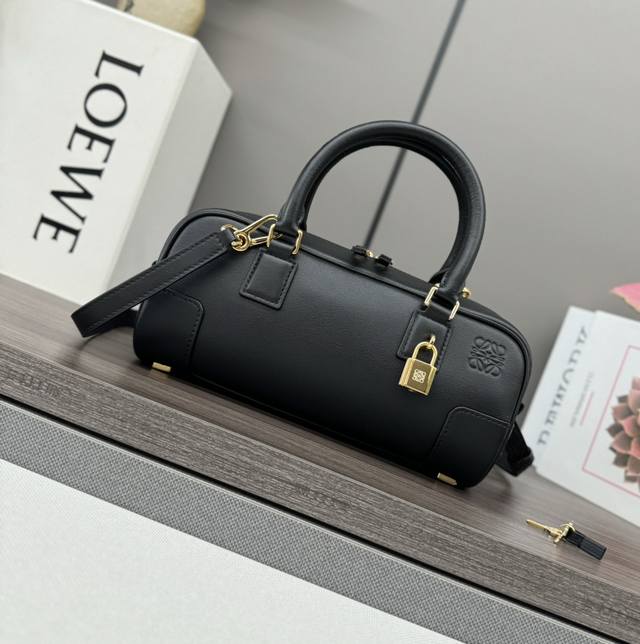 Low's new mini Amazona 23 Cropped handbag. *The latest size of the bowling bag.