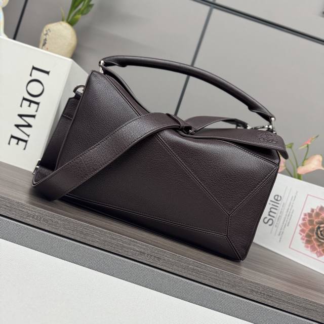 Low New Large Puzzle Bag in soft deerskin, featuring a rectangular shape defined