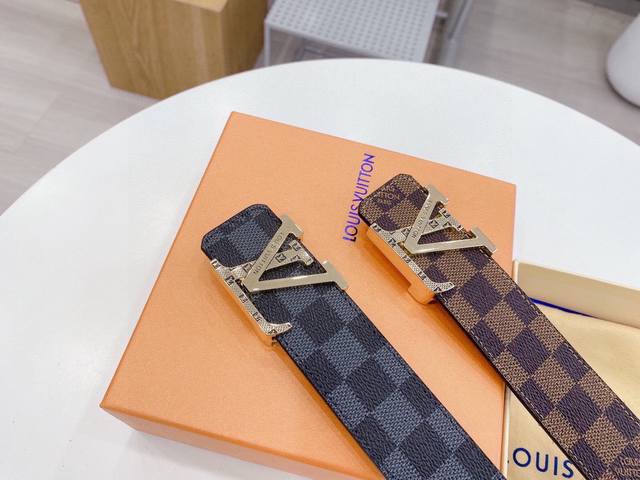 Louis Vuitton imported, original, classic men's belt. Made of Togo leather, this