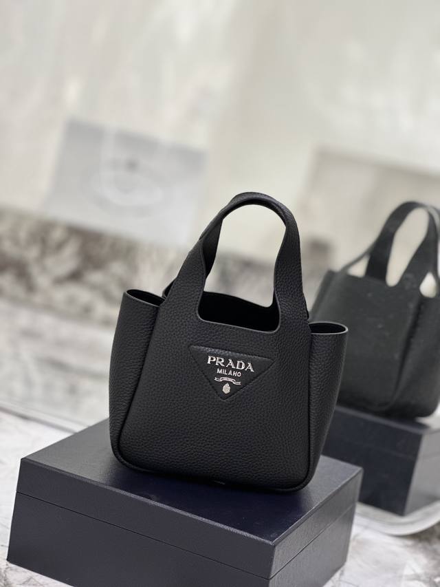 Small Basket Bucket Bag, crafted from soft and delicate lychee-grained calfskin