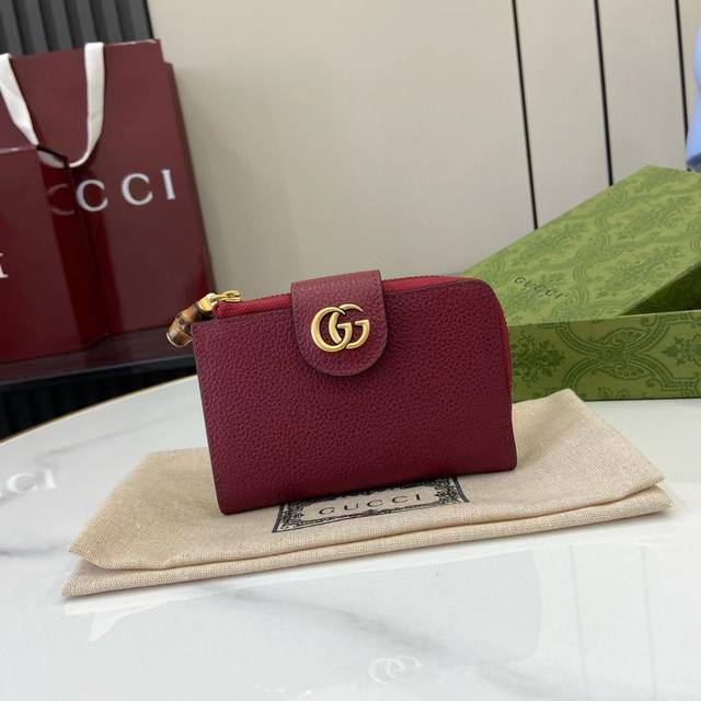 Premium Gg Marmont Wallet. Crafted in timeless wine-colored leather, this Gg Mar