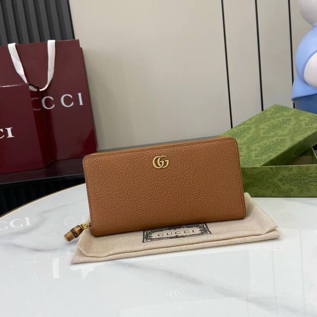 Premium Gg Marmont Series Long Wallet. Crafted in timeless burgundy leather, thi