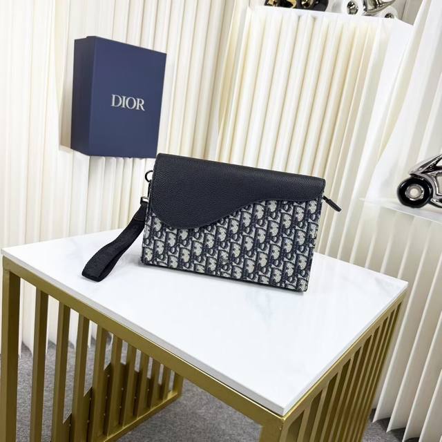 the most premium version on the market. Compare the Saddle A5 Triangle Clutch in