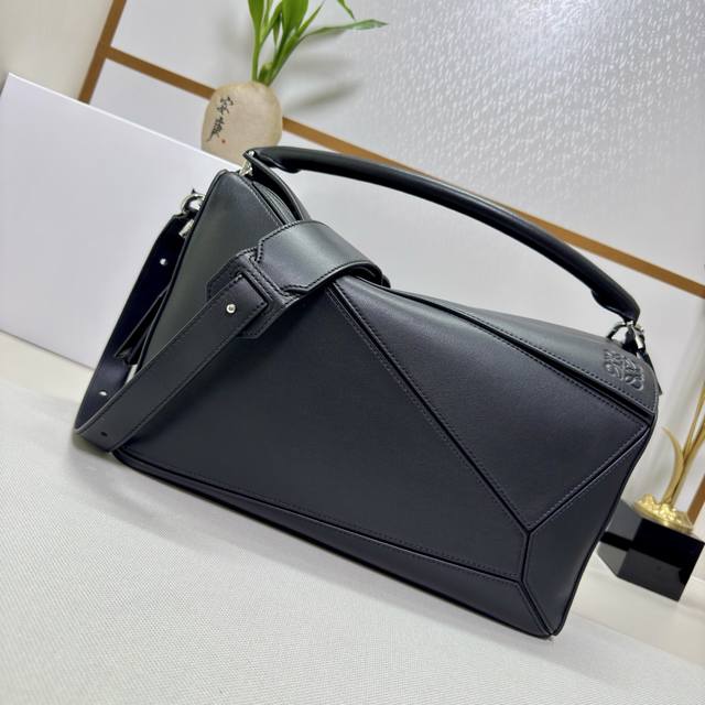 Low The new large nappa leather Featherlight Puzzle handbag features a rectangul