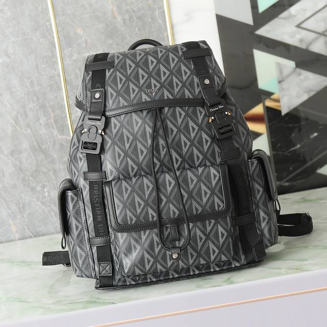 Medium Dior Hit The Road Backpack in Black Cd Diamond Canvas and Black P30,000.