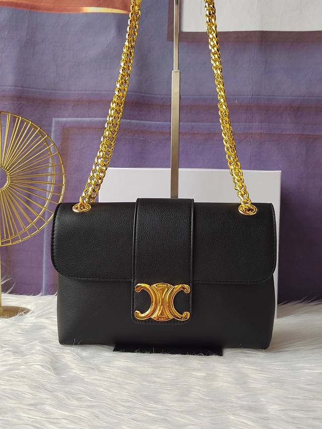 Style 115853 Medium black crossbody and shoulder leather handbag with gold finis