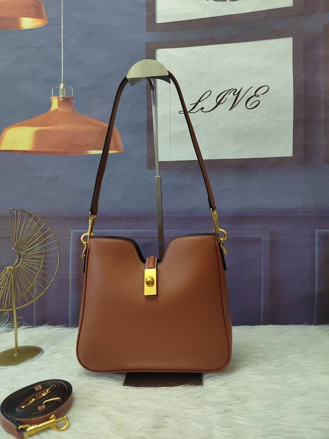 Model No. 120693 Brown leather handbag, can be carried by hand, on the shoulder