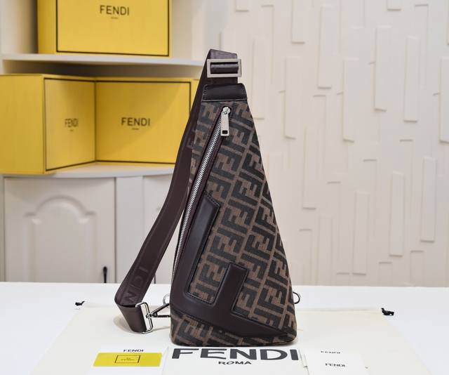 This chest-strap, tapered shoulder bag is crafted from full-grain leather and fe