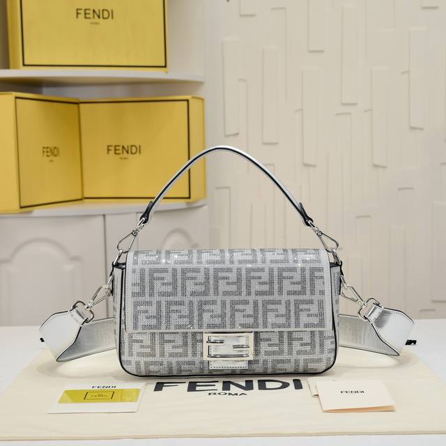 Buckle. Features a front flap, magnetic clasp and silver laminated leather detai