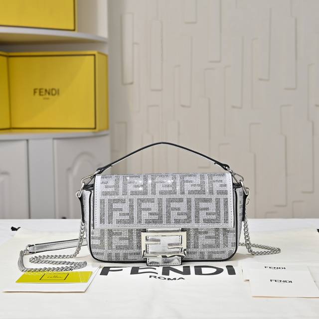 diamond-studded baguette! The shoulder bag, also known as the "baguette bag," ha