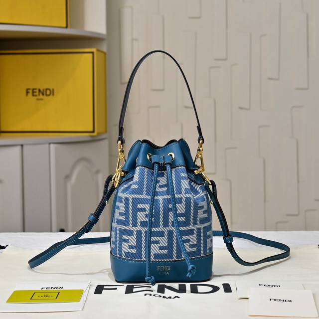 Original fabric Mon Tresor bucket bag with classic monogram logo and calfskin ma
