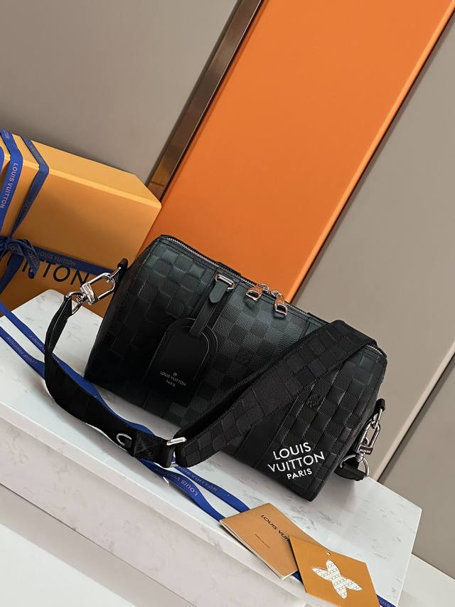 a top-of-the-line, original, and all-steel City Keepall handbag. This model feat