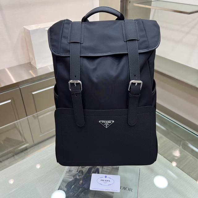 Prada's new backpack is stylish and versatile, with a sophisticated look! Made o