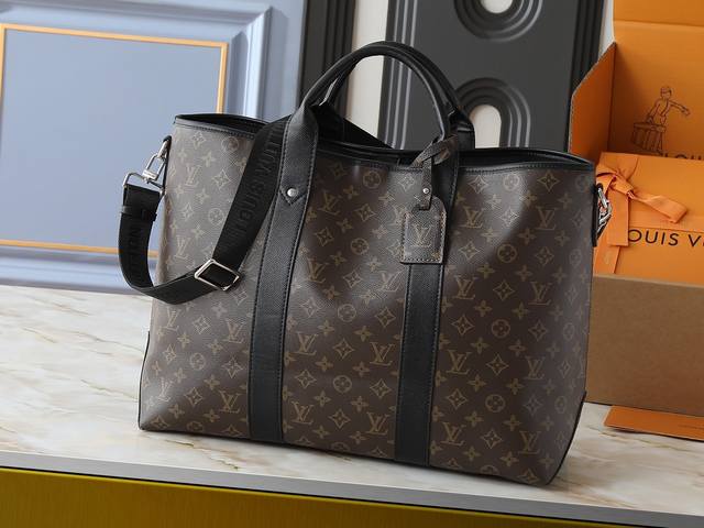 upgrades the original M30937. This Weekend Tote is crafted from Monogram canvas