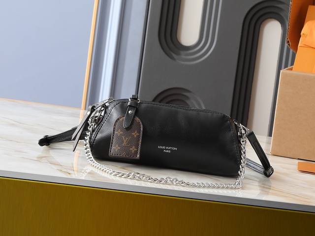 Updated from the original M14544. This Pochette Vibe bag from the LV Vibe collec