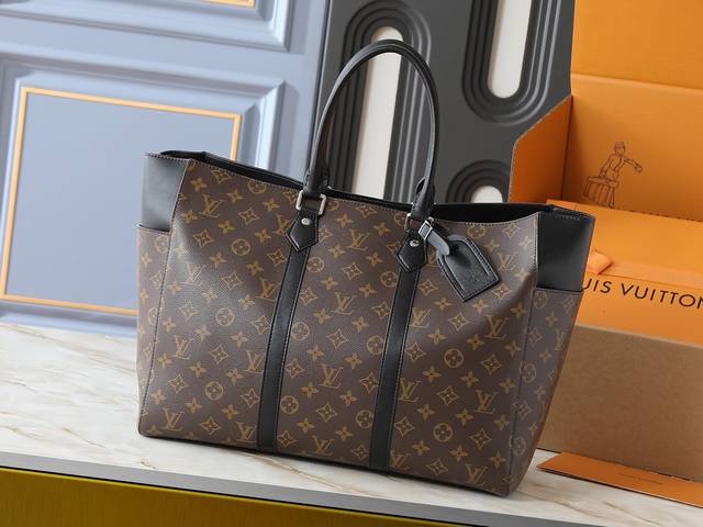 upgrades the original M46451 with black and monogram embossing. As a spacious mo