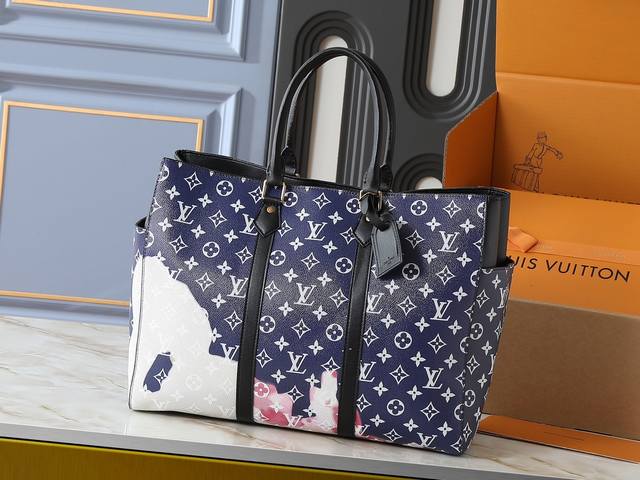 is an update of the original M46451 M46812 flame blue handbag, featuring hand-sp