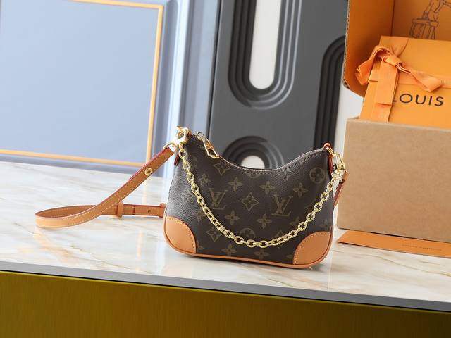 This is an updated version of the original M25519 Monogram Mini Croissant Nano B