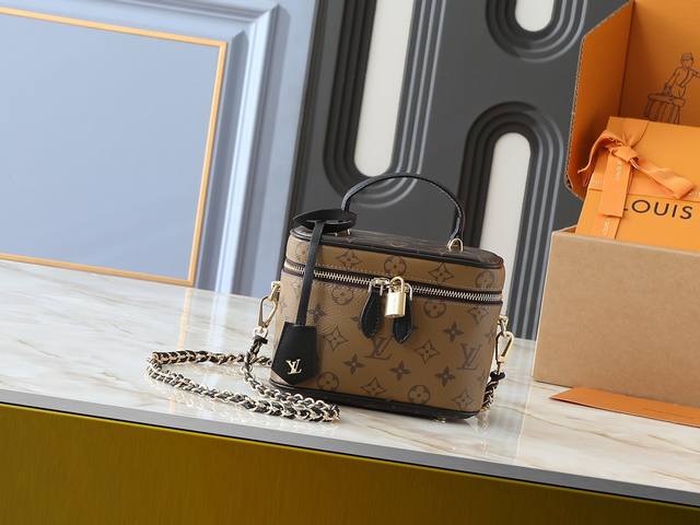 an upgrade from the original M45165, this small Vanity bag celebrates Nicolas Gh
