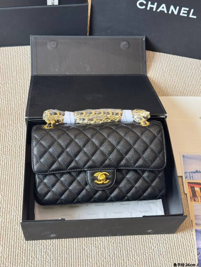 Caviar-patterned Chane* - A must-have bag from the Chanel line for all seasons,