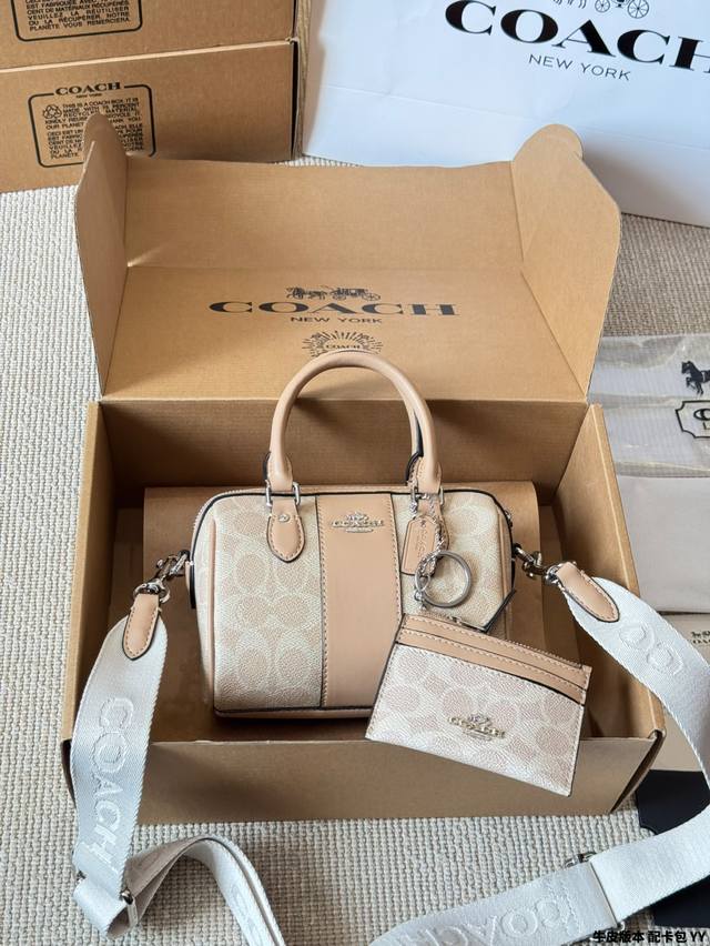 cowhide version with card holder Coach