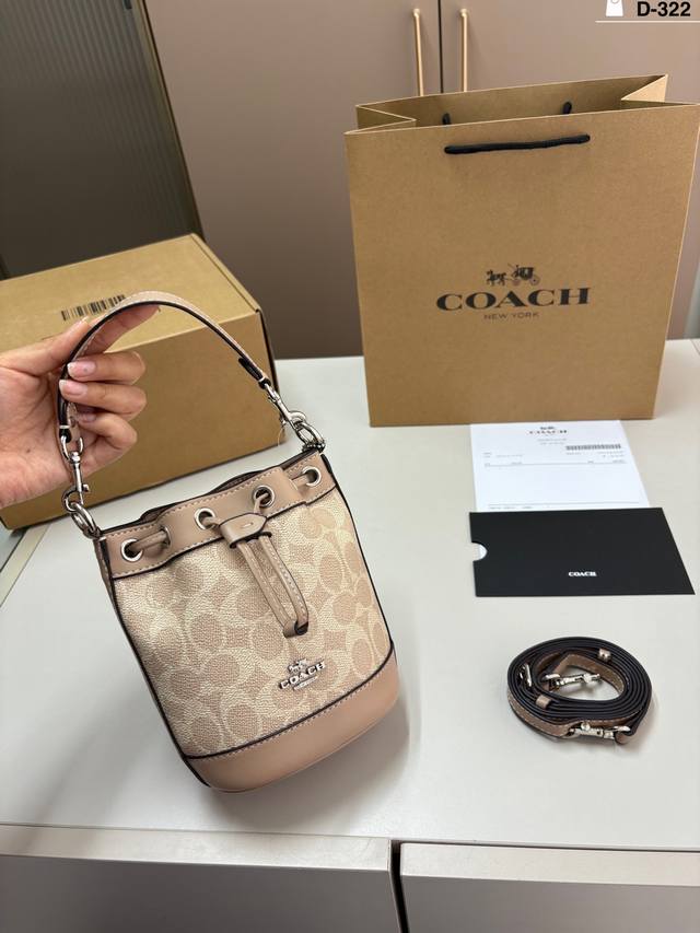 Coach's new bucket bag features a drawstring design and is very spacious. D-322
