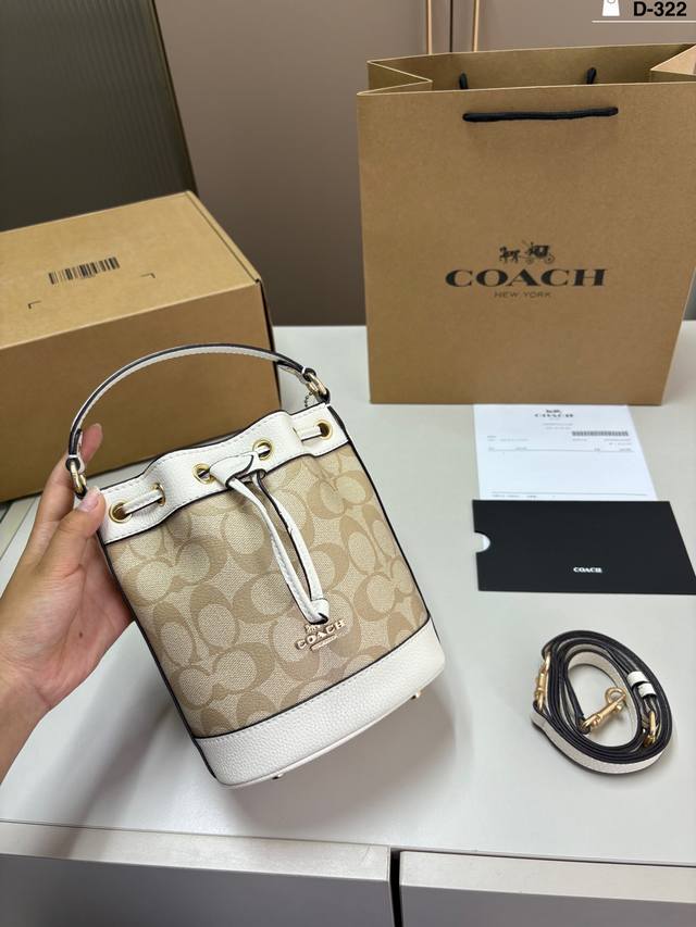 Coach's new bucket bag features a drawstring design and is very spacious. D-322