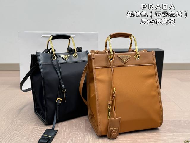 with box. This Prada tote bag has a high-end texture and is very spacious and du