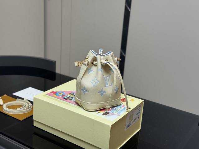with folding box Size: 13*16cmlv New Nano bucket bag restock just arrived! Cowhi