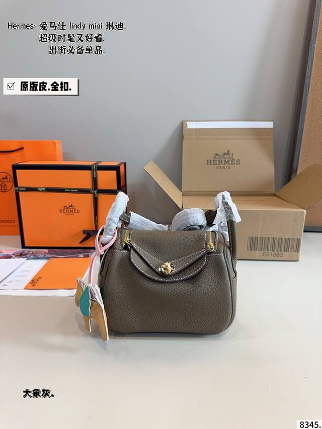 gold buckle with gift box. Herm