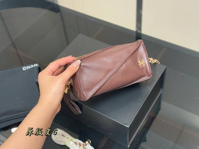 This unboxed Chanel lantern handbag is so cute and unique. It literally looks li
